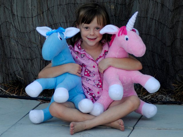 large horse and unicorn soft toy