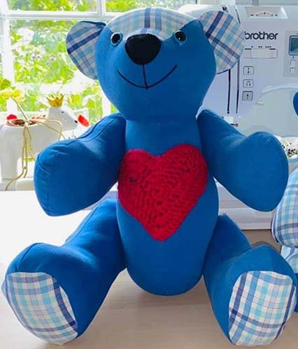 Calico bear with heart sewn by GlynisDuckenfield