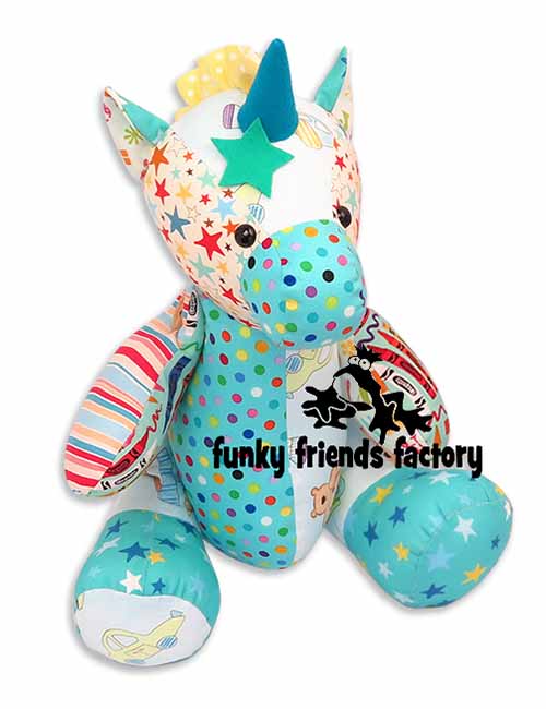 A blue Keepsake Unicorn Memory Toy